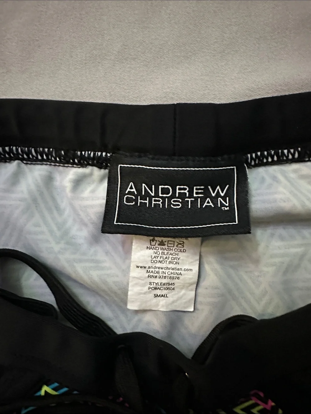 Andrew Christian Black Swim Briefs with Neon Pink, Yellow & Blue Geo Print